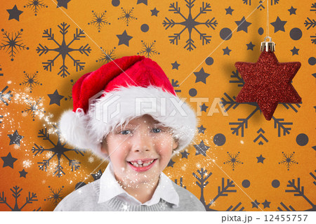 Composite image of festive boy smiling 12455757