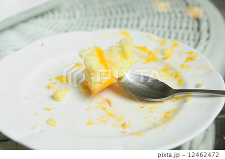 Soiled cake plates on rattan table Soiled cake plates on rattan table 12462472