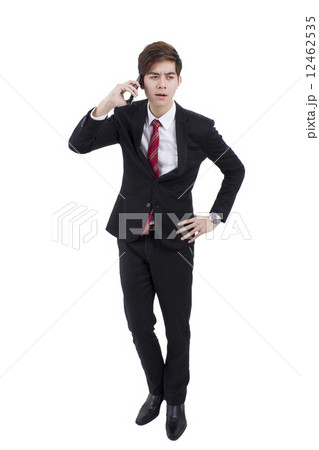 Business man busy talking on the phone Business man busy talking on the phone 12462535