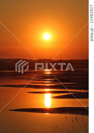 beautiful sunset with waved river sand beach beautiful sunset with waved river sand beach 12462927