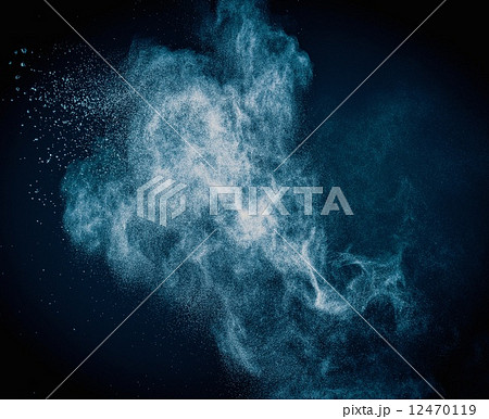 Blue powder exploding isolated on black Blue powder exploding isolated on black 12470119