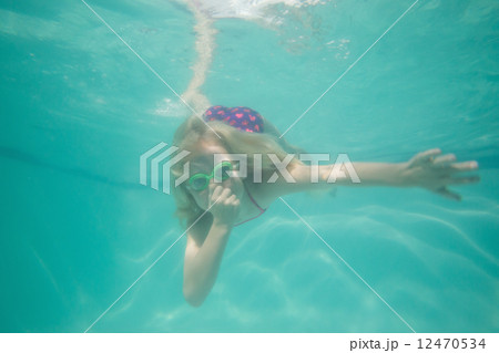 Cute kid posing underwater in pool 12470534