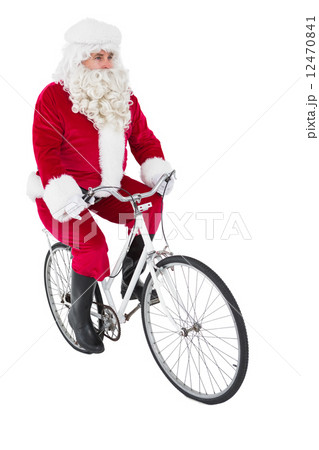 Cheerful father christmas cycling Cheerful father christmas cycling 12470841