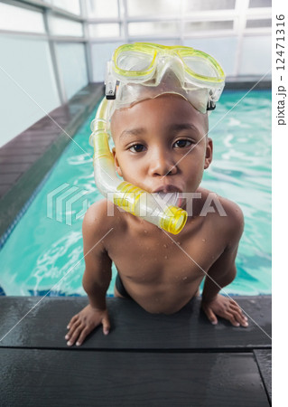 Cute little boy wearing snorkel and goggles Cute little boy wearing snorkel and goggles 12471316