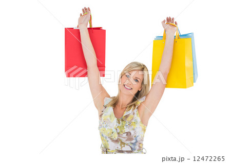 Happy blonde with shopping bags 12472265