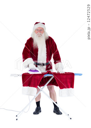 Santa is ironing his pants 12472529