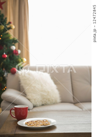 Cookies and mug on coffee table at christmas Cookies and mug on coffee table at christmas 12472845