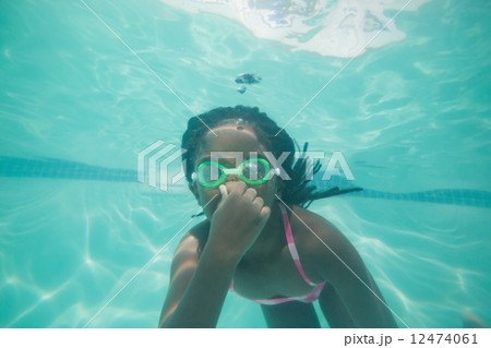 Cute kid posing underwater in pool 12474061