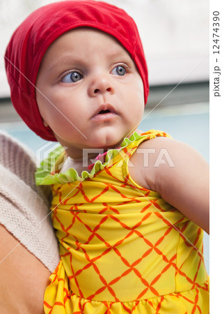 Pretty mother and baby at the swimming pool 12474390