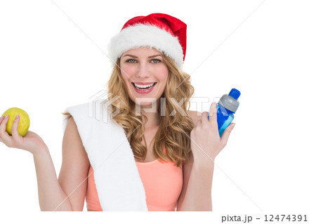 Festive fit blonde smiling at camera 12474391