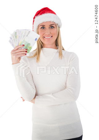 Festive blonde holding her cash 12474600