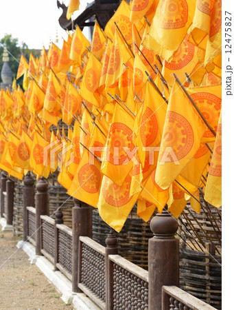 Flag of Dharmacakra, symbol of buddhism in thai temple, Thailand 12475827