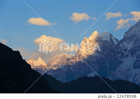 sunset in the mountains Himalayas, Thamserku, Kantaiga, Nepal sunset in the mountains Himalayas, Thamserku, Kantaiga, Nepal 12478506