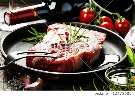 Raw beef steak and wine 12478680