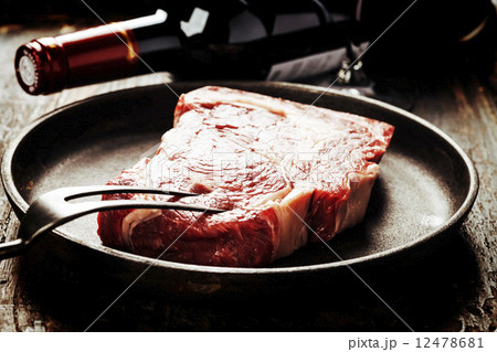Raw beef steak and wine 12478681