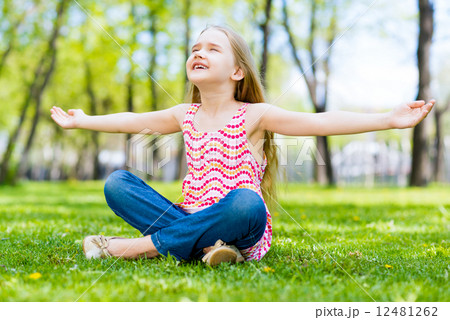 portrait of a girl in a park portrait of a girl in a park 12481262