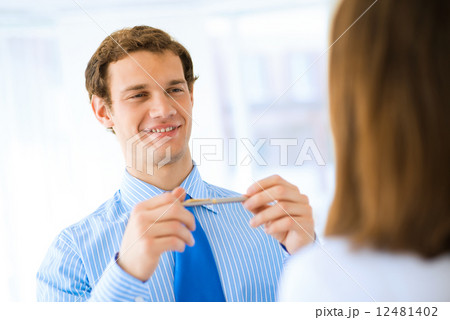 Young businessman doing interviews Young businessman doing interviews 12481402