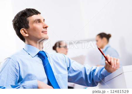 Portrait of a businessman in a blue shirt 12481529