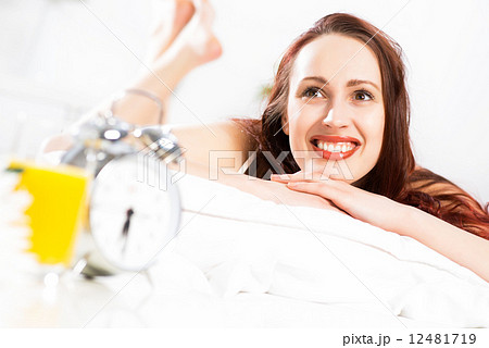 portrait of a young woman in the bedroom 12481719