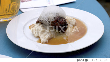 Glazed cheek of Iberian pork in sherry and cream with rice and m Glazed cheek of Iberian pork in sherry and cream with rice and m 12487908