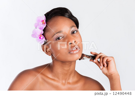 Beautiful African woman in Studio with makeup Beautiful African woman in Studio with makeup 12490448