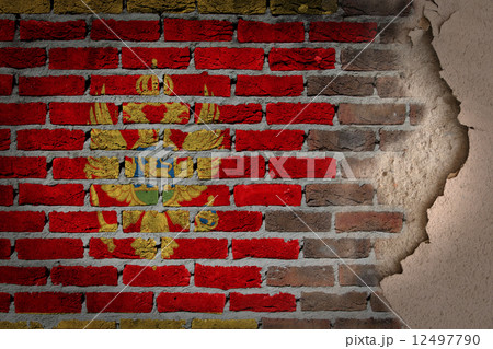 Dark brick wall with plaster - Montenegro 12497790
