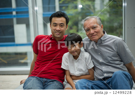 three generation asian men enjoying family bonding time together three generation asian men enjoying family bonding time together 12499228