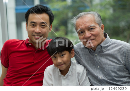 three generation asian men enjoying family bonding time together three generation asian men enjoying family bonding time together 12499229