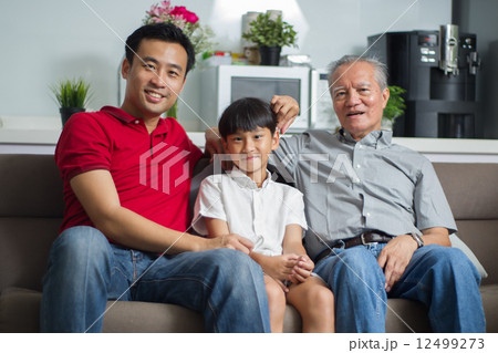 3 generation Asian family enjoying a bonding moment together at home 3 generation Asian family enjoying a bonding moment together at home 12499273
