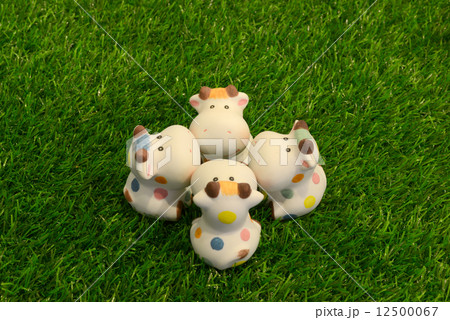 Cow doll on the grass. 12500067