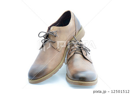 Leather brown shoes isolated on white background Leather brown shoes isolated on white background 12501512