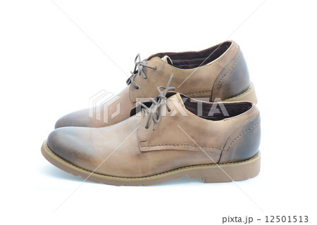 Leather brown shoes isolated on white background Leather brown shoes isolated on white background 12501513