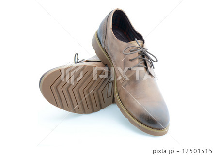 Leather brown shoes isolated on white background Leather brown shoes isolated on white background 12501515