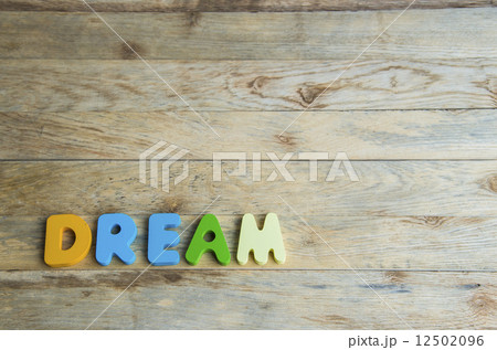 Colorful wooden word Dream on wooden floor2 Colorful wooden word Dream on wooden floor2 12502096