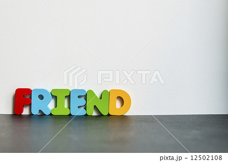 Colorful wooden word Friend with white background 12502108