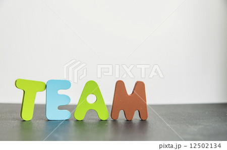 Colorful Wooden word team with white background Colorful Wooden word team with white background 12502134