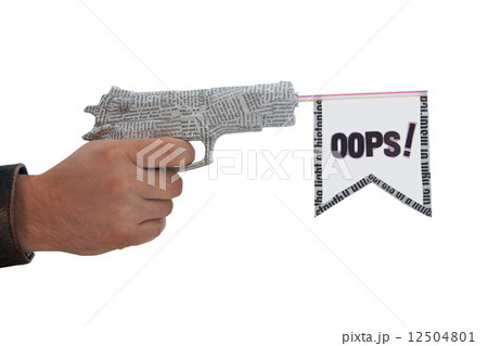 male hand with shoting newspaper pistol and flag on white backgr male hand with shoting newspaper pistol and flag on white backgr 12504801