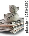 newspaper duck on a stack of newspaper 12504820