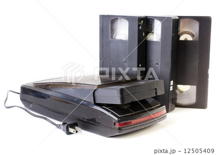 Video Cassette and Vintage VHS Rewinder 12505409