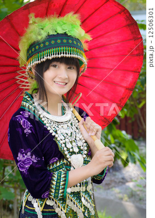 cute asian girl in beautiful hill tribe (HMONG) costume of 12506301