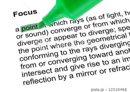 Highlighted word point for Focus with green pen over white. 12510468