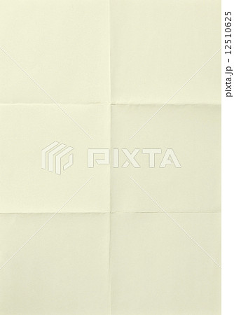 Yellow sheet of paper folded 12510625