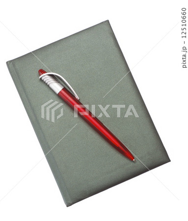 Red Pen on a dark notebook 12510660