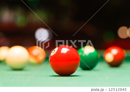 Billiard balls in a pool table. 12512045