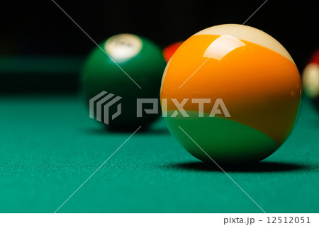 Billiard balls in a pool table. 12512051