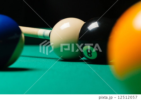 Billiard balls in a pool table. 12512057