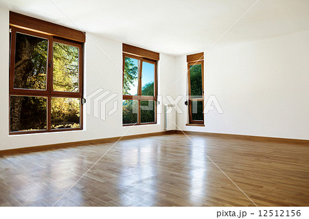 Empty interior room and windows 12512156
