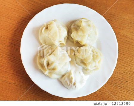 top view of manti dumpling on white plate top view of manti dumpling on white plate 12512596