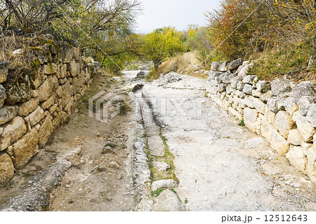 stone road in medieval town Chufut-Kale in Crimea 12512643