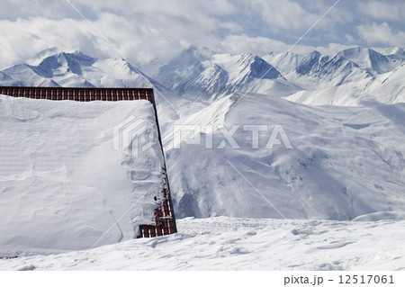 Hotel in snow and ski slope Hotel in snow and ski slope 12517061
